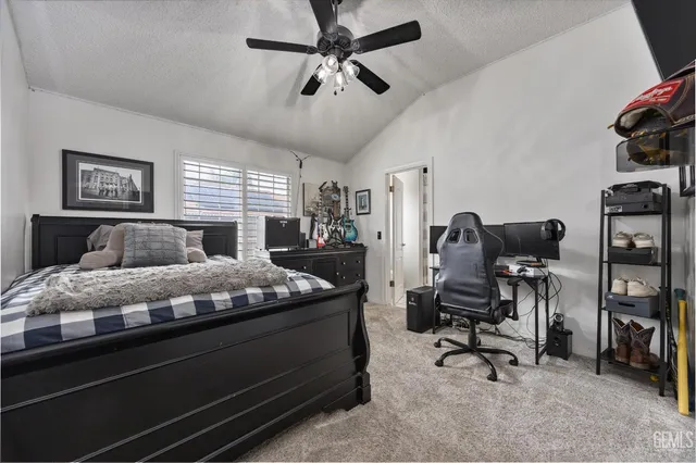 a view of a kitchen with a sink and wooden floor
