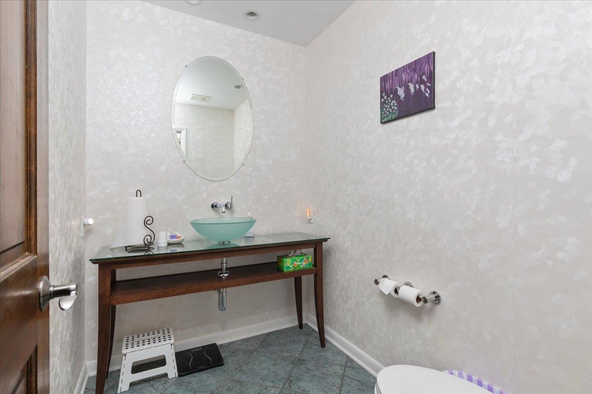 209 Park Ridge Court Front Royal, VA 22630 - Photo 16 of 59 a bathroom with a toilet sink and mirror