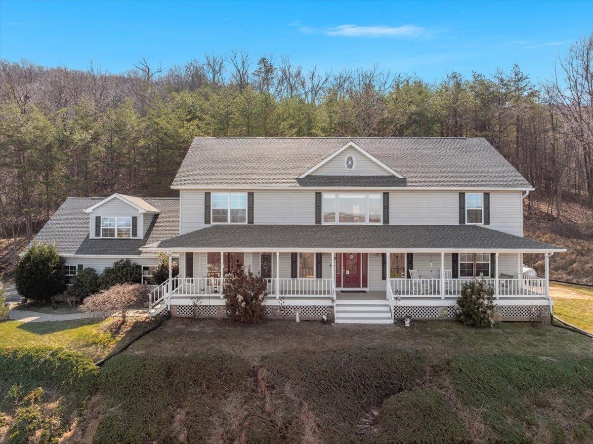 209 Park Ridge Court Front Royal, VA 22630 - Photo 2 of 59 a aerial view of a house next to a big yard and large trees