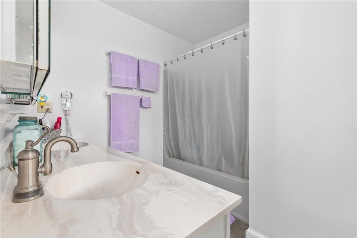 209 Park Ridge Court Front Royal, VA 22630 - Photo 37 of 59 a bathroom with a sink and a mirror