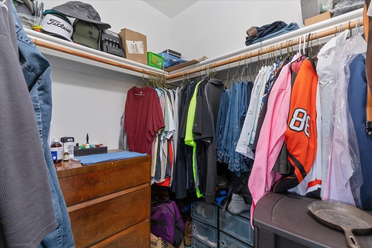 209 Park Ridge Court Front Royal, VA 22630 - Photo 40 of 59 a view of walk in closet with clothes and shoes