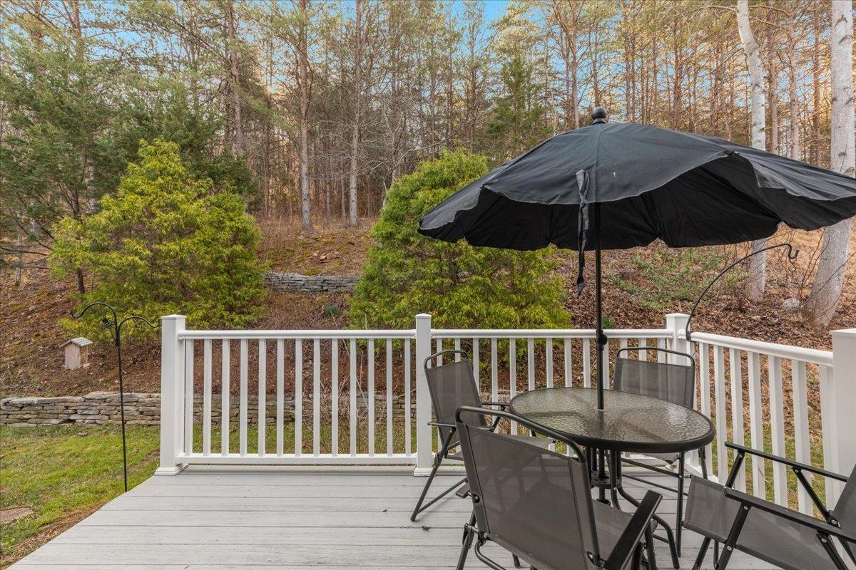 209 Park Ridge Court Front Royal, VA 22630 - Photo 43 of 59 a view of a deck with furniture and barbeque oven in the backyard