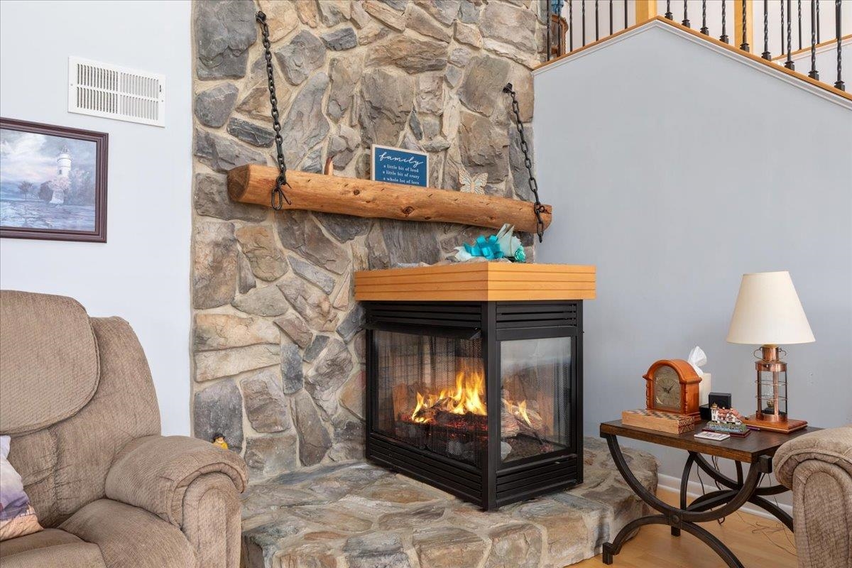209 Park Ridge Court Front Royal, VA 22630 - Photo 8 of 59 a living room with furniture and a fireplace