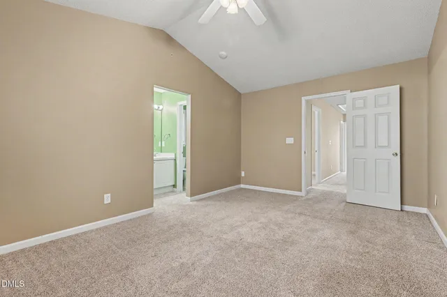 a bathroom with a double vanity sink mirror and shower