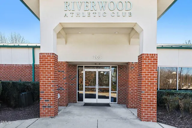 a view of swimming pool with seating space