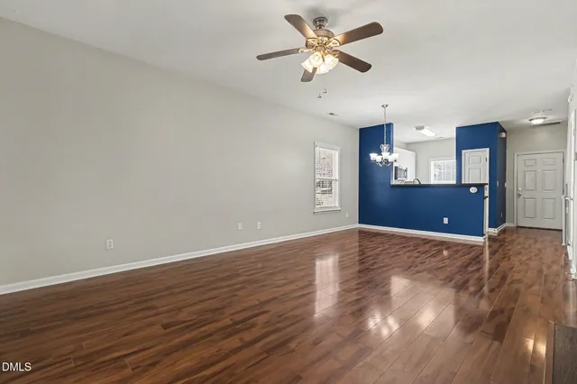 a view of a hallway with windows