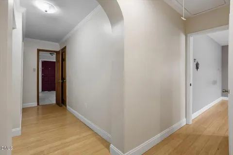 a view of hallway with closet