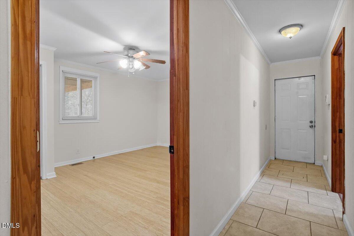 2903 Neville Road Chapel Hill, NC 27516 - Photo 21 of 47 an empty room with closet and a chandelier fan