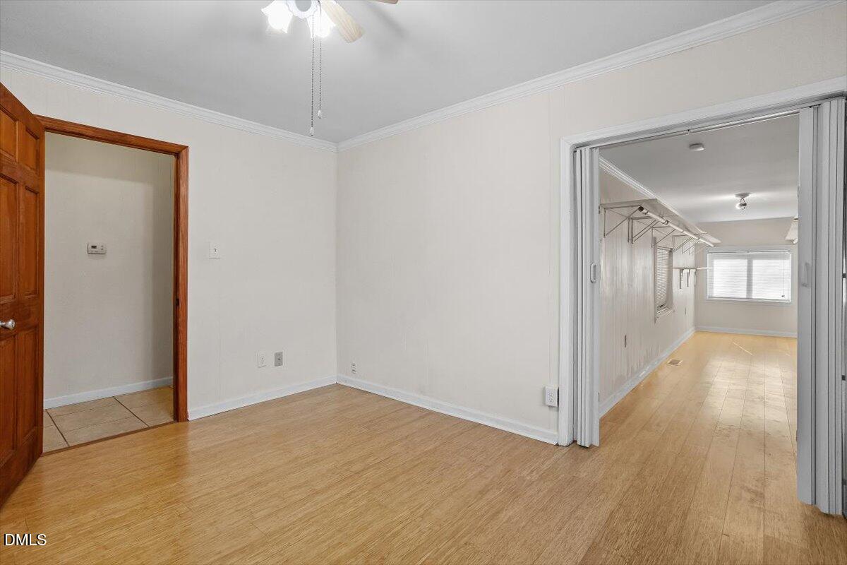 2903 Neville Road Chapel Hill, NC 27516 - Photo 29 of 47 a view of a hallway with wooden floor