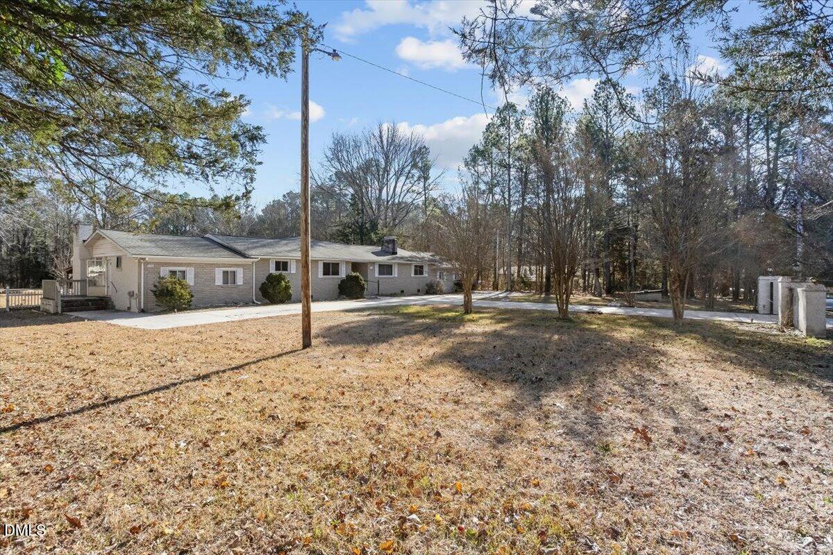 2903 Neville Road Chapel Hill, NC 27516 - Photo 3 of 47 a house with trees in front of it