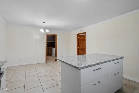 a view of storage and utility room with washer and dryer
