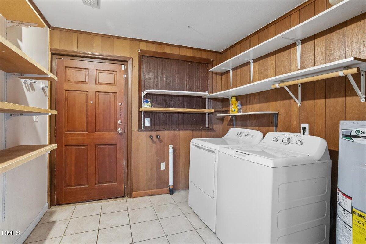 2903 Neville Road Chapel Hill, NC 27516 - Photo 34 of 47 a view of storage and utility room with washer and dryer