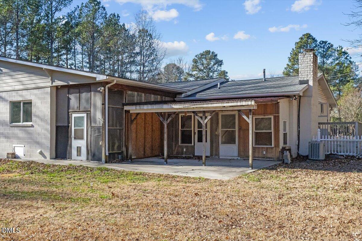 2903 Neville Road Chapel Hill, NC 27516 - Photo 45 of 47 a front view of a house with a garden