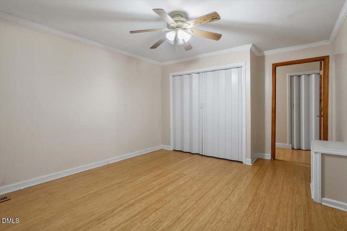 2903 Neville Road Chapel Hill, NC 27516 - Photo 9 of 47 a view of a room with wooden floor