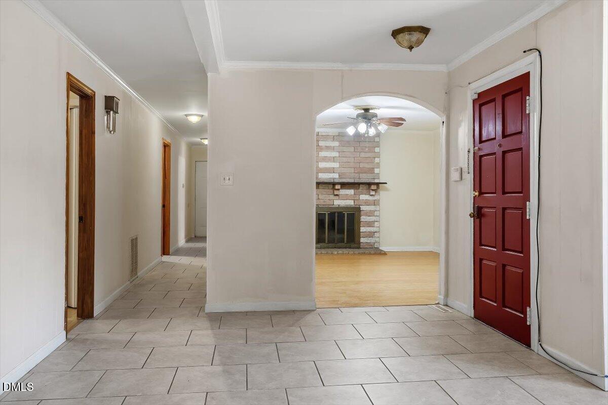 2903 Neville Road Chapel Hill, NC 27516 - Photo 10 of 47 an empty room with kitchen view and a window