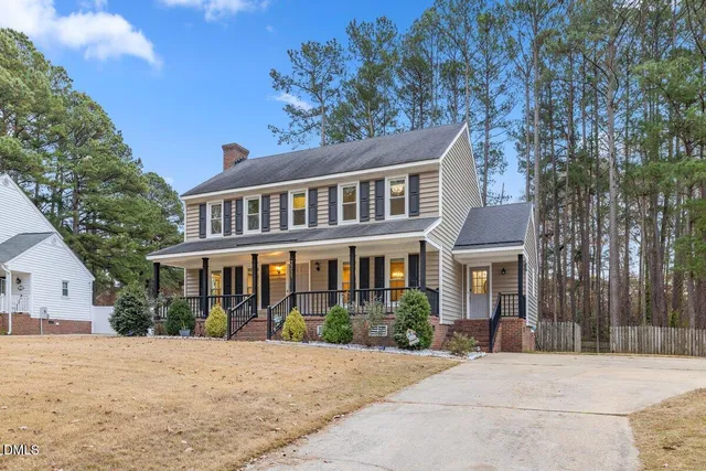 a view of a hallway with wooden walls and windows