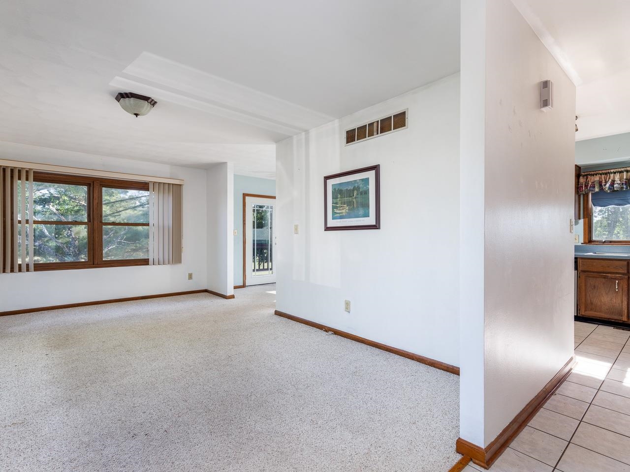 1476 Chadbourne Drive Lake Summerset, IL 61019 - Photo 4 of 22 a view of an empty room with window and cabinet