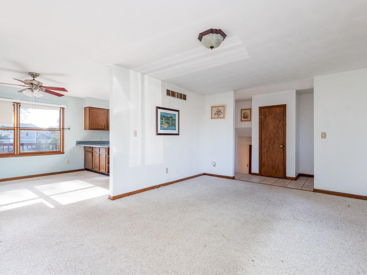 1476 Chadbourne Drive Lake Summerset, IL 61019 - Photo 6 of 22 an empty room with windows and cabinet
