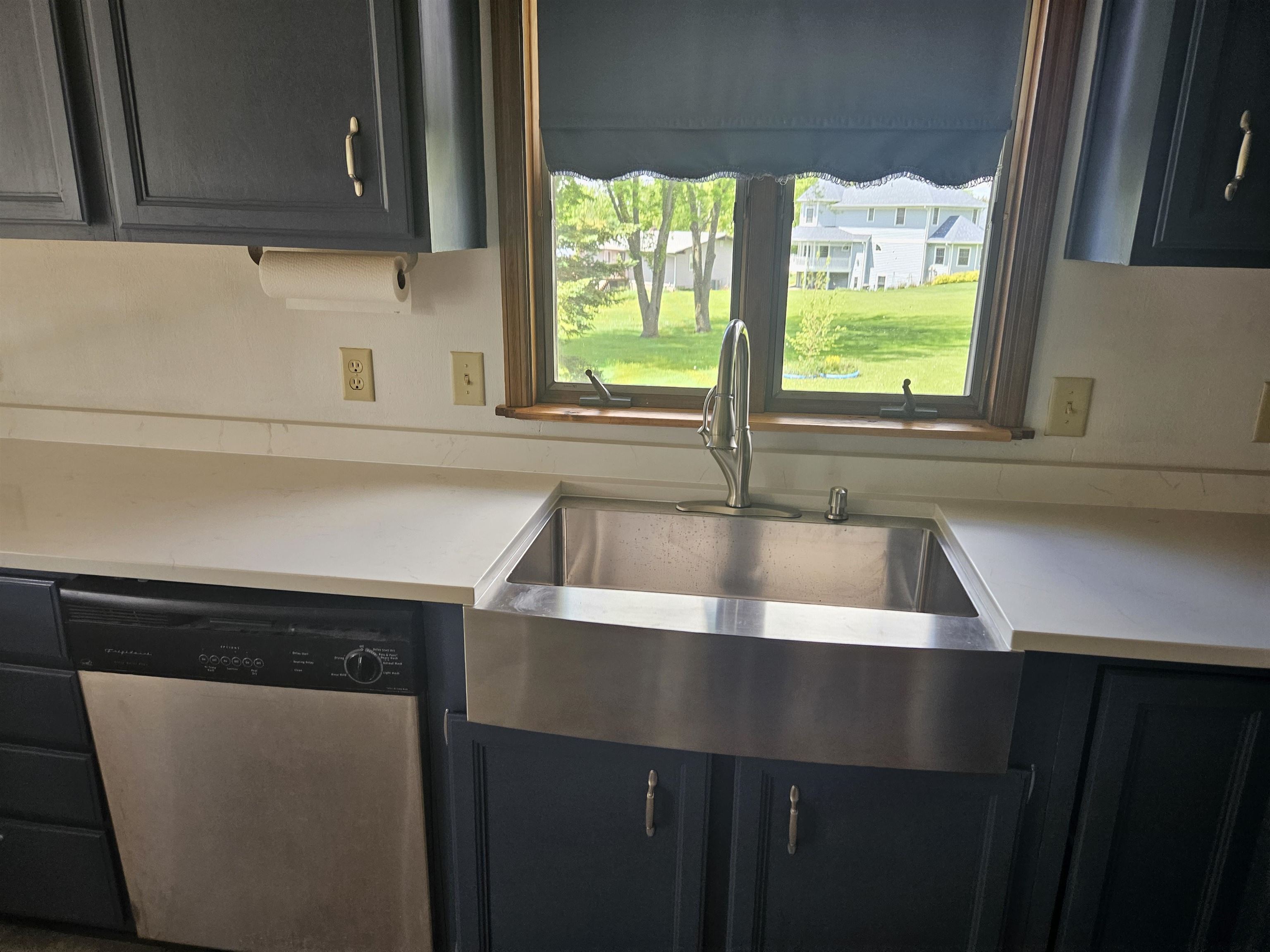 1476 Chadbourne Drive Lake Summerset, IL 61019 - Photo 9 of 22 a kitchen with a sink a window and cabinets