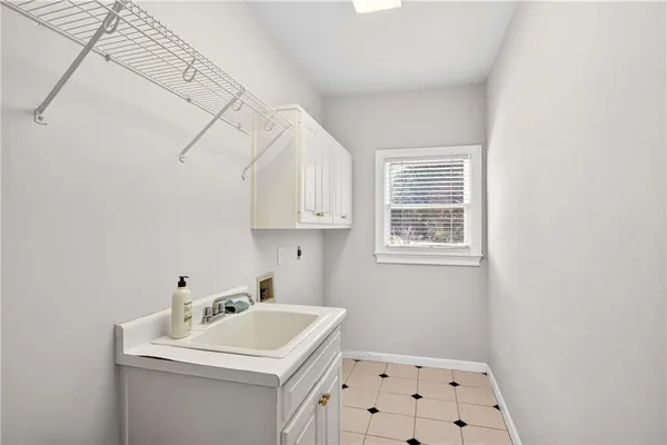 a kitchen with stainless steel appliances granite countertop a stove and a refrigerator
