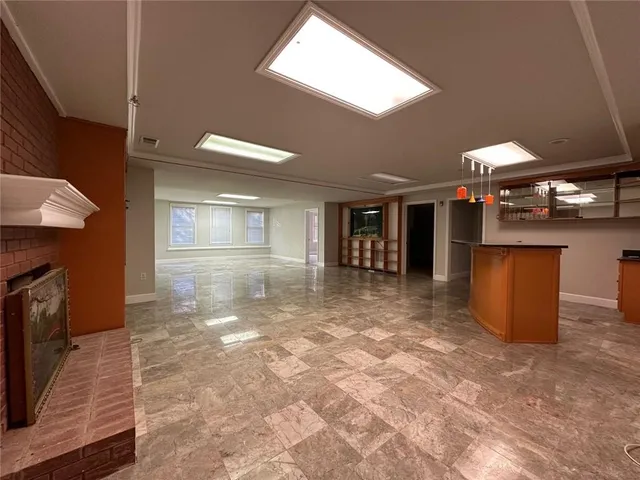 a view of a kitchen with a sink