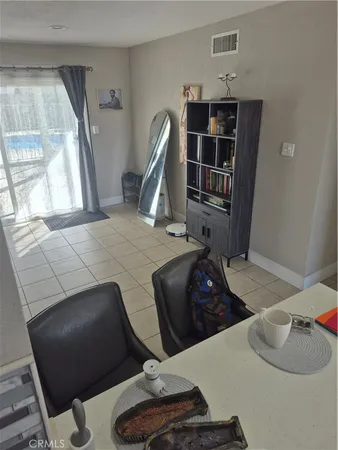a kitchen with sink cabinets and window