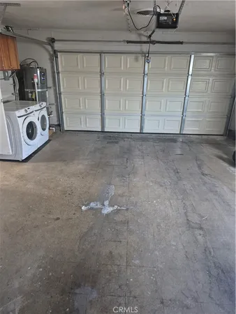 a bathroom with a sink a mirror and a shower