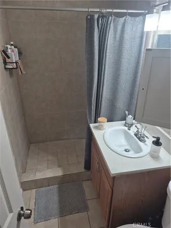 a view of a livingroom with furniture and entryway