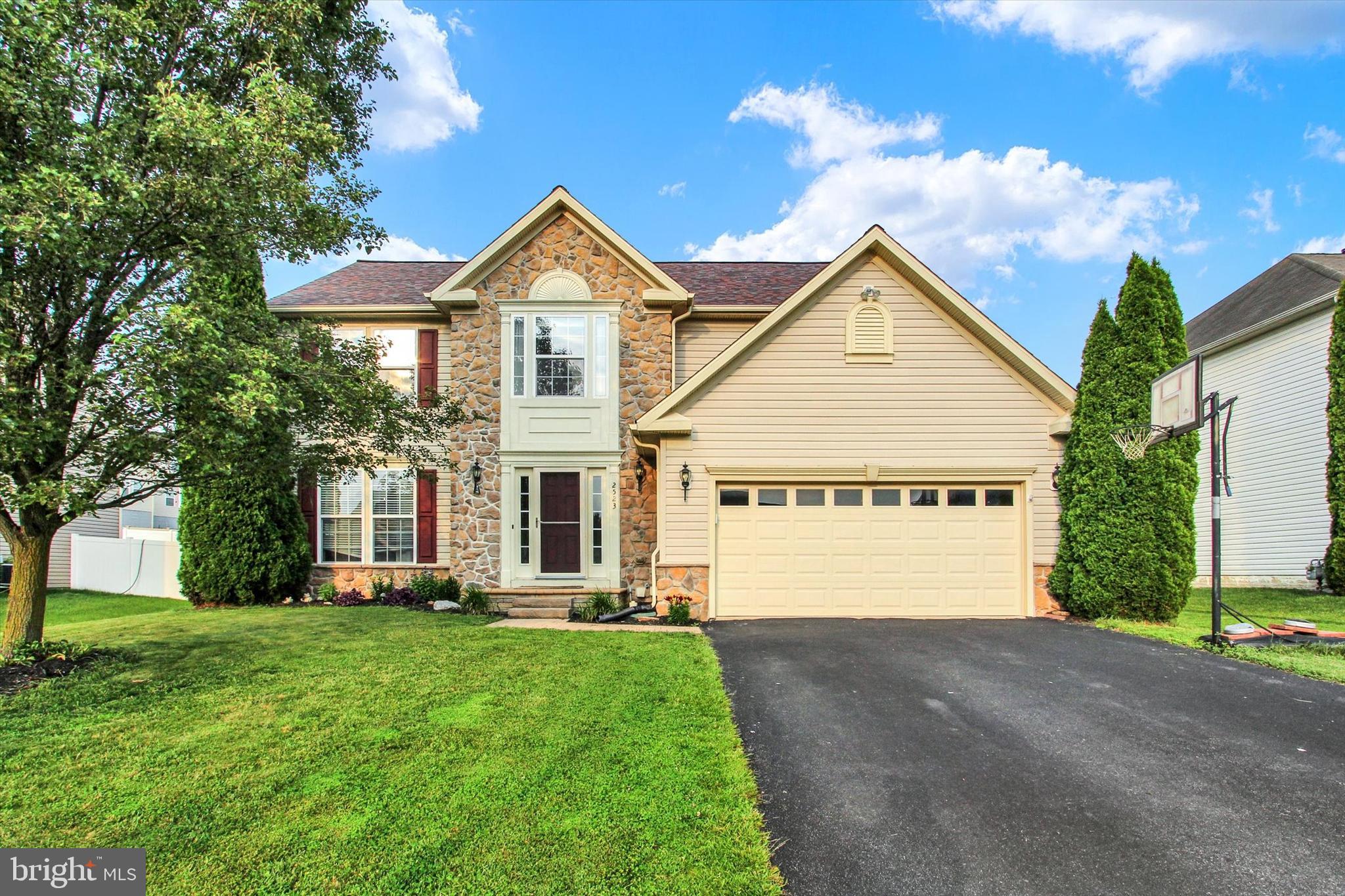 a view of outdoor space yard and front view of a house
