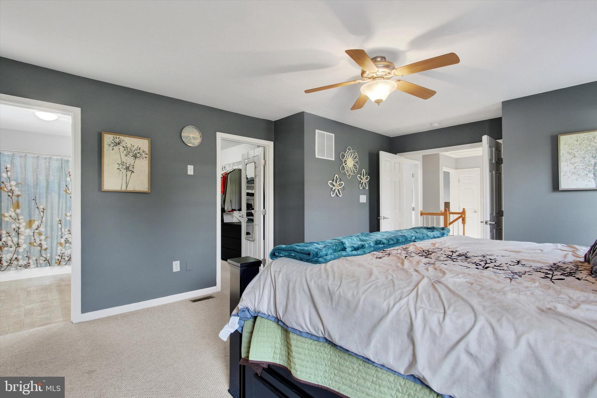 2523 Codorus Lane Spring Grove, PA 17362 - Photo 22 of 53 a bedroom with a bed and a chandelier