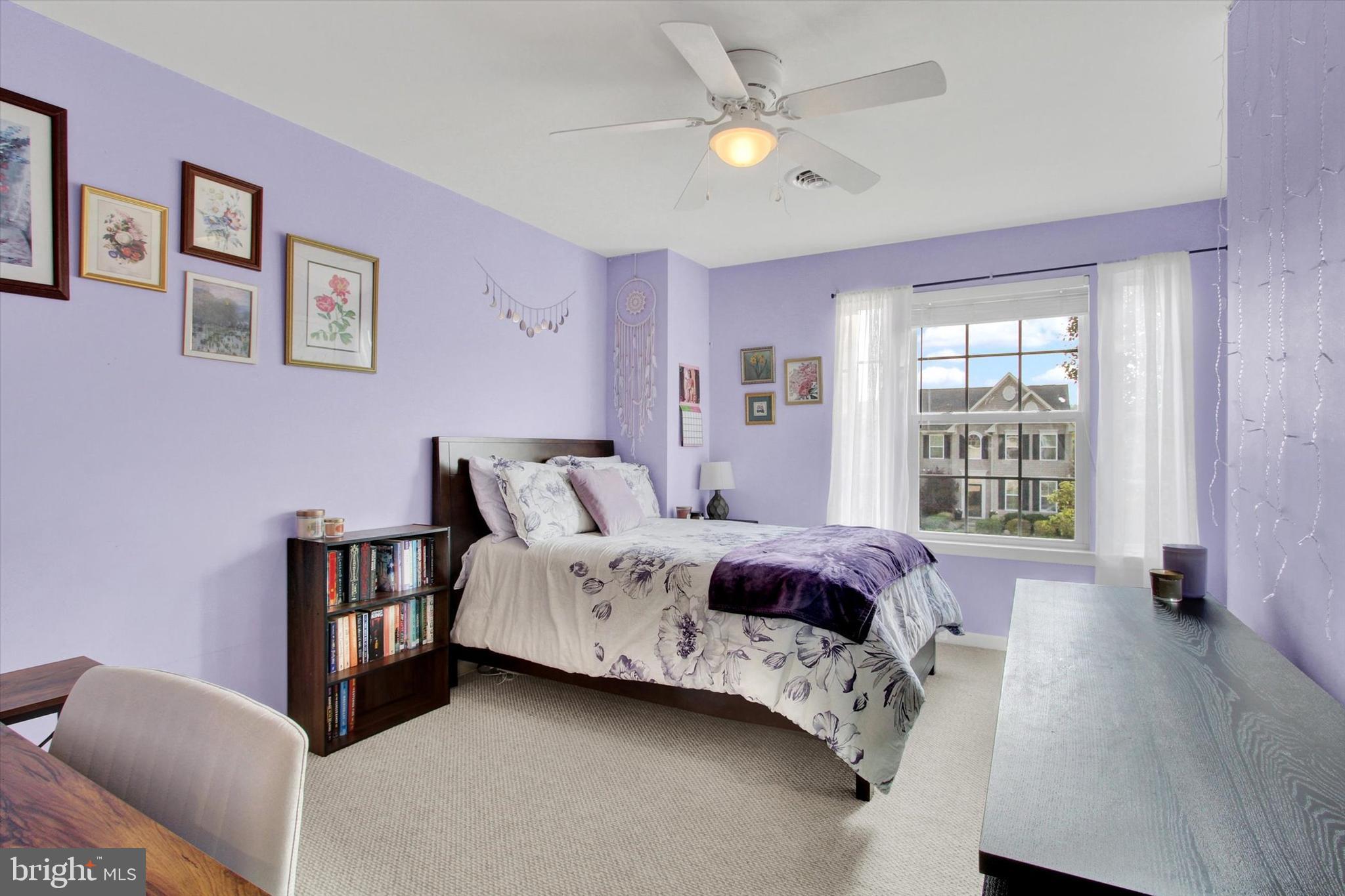 2523 Codorus Lane Spring Grove, PA 17362 - Photo 24 of 53 a spacious bedroom with a bed couch and a window