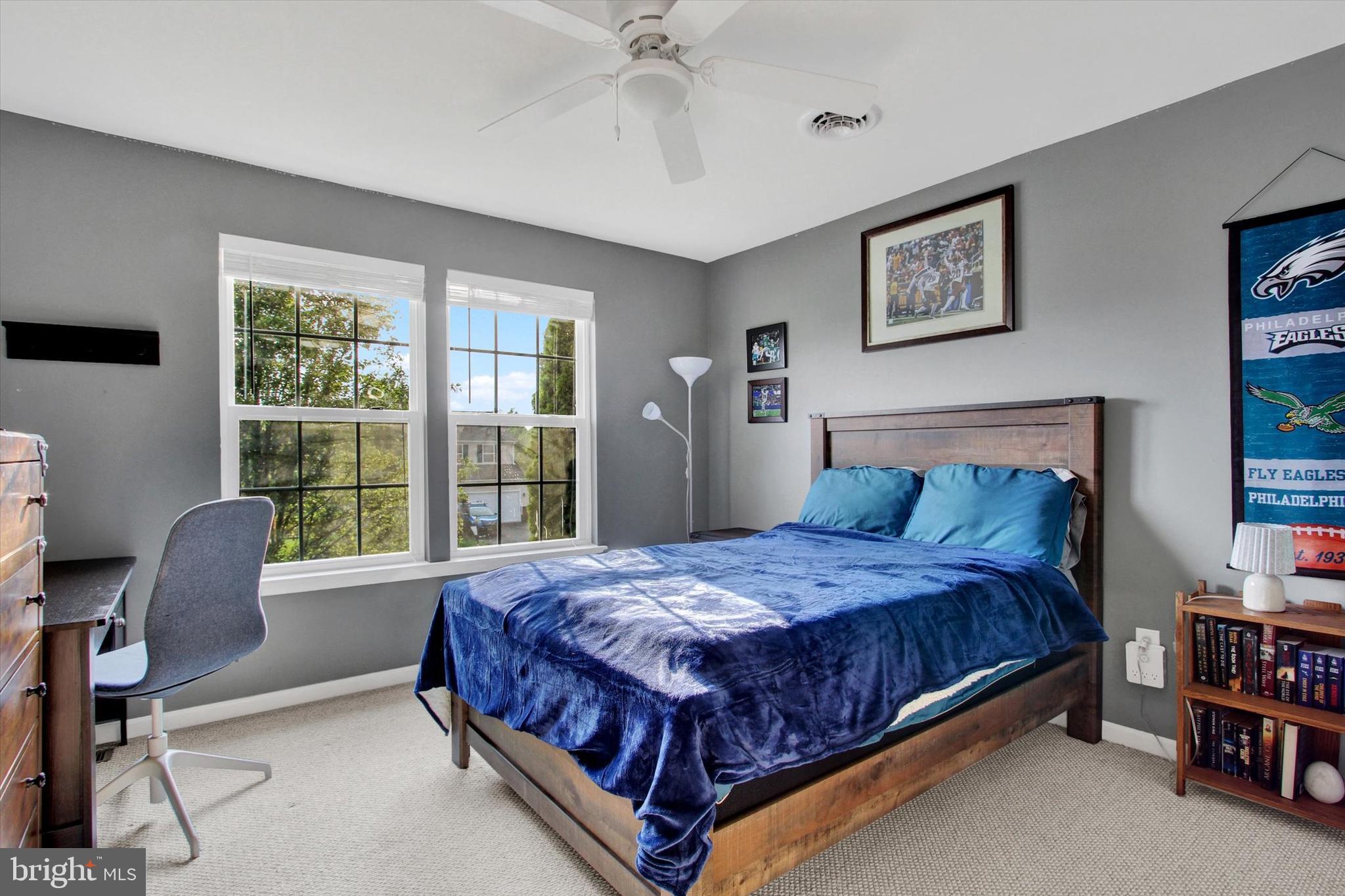 2523 Codorus Lane Spring Grove, PA 17362 - Photo 25 of 53 a bedroom with a bed a chandelier and a window