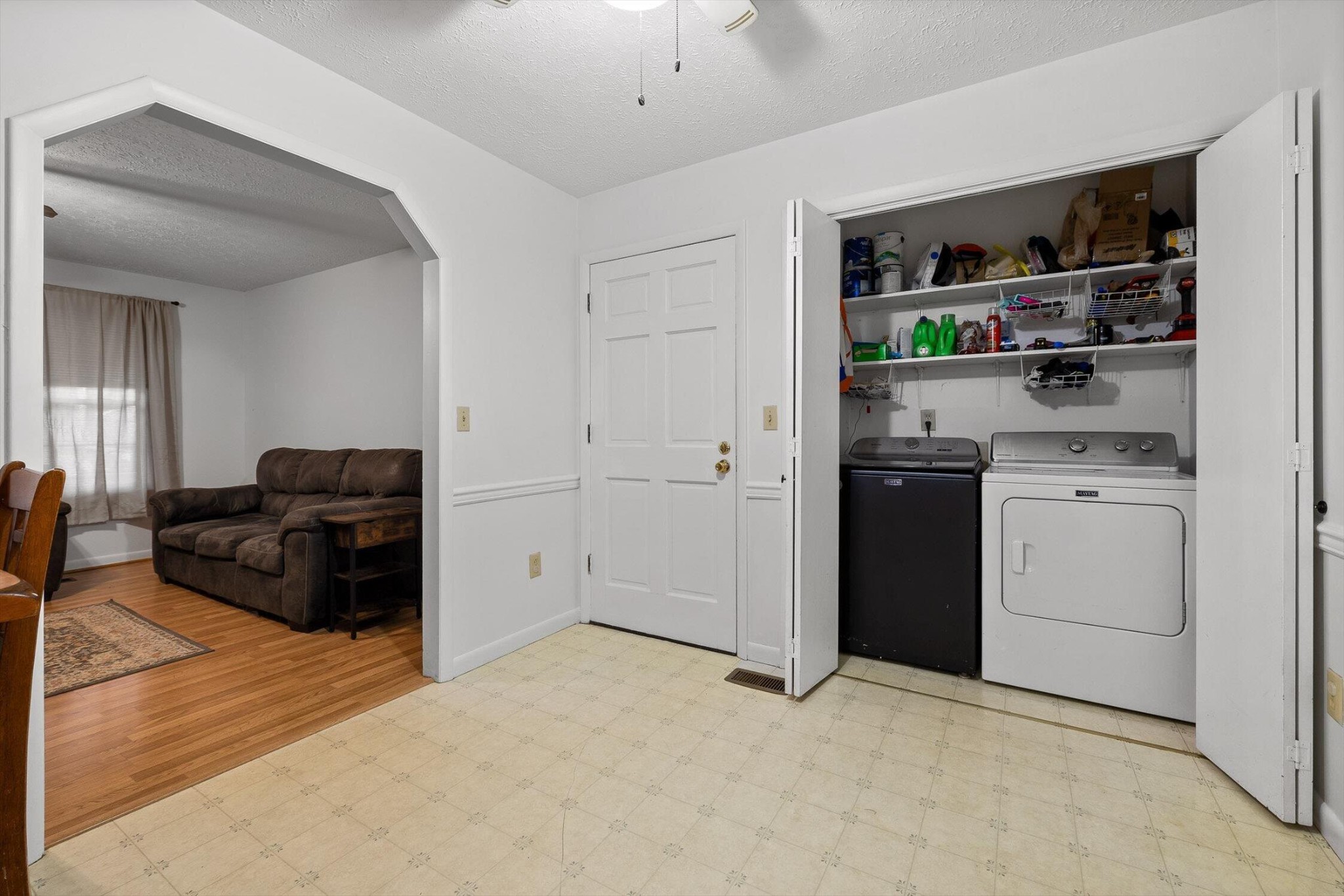 138 Sunset Drive Whitwell, TN 37397 - Photo 13 of 46 a living room with stainless steel appliances kitchen island granite countertop a refrigerator and cabinets