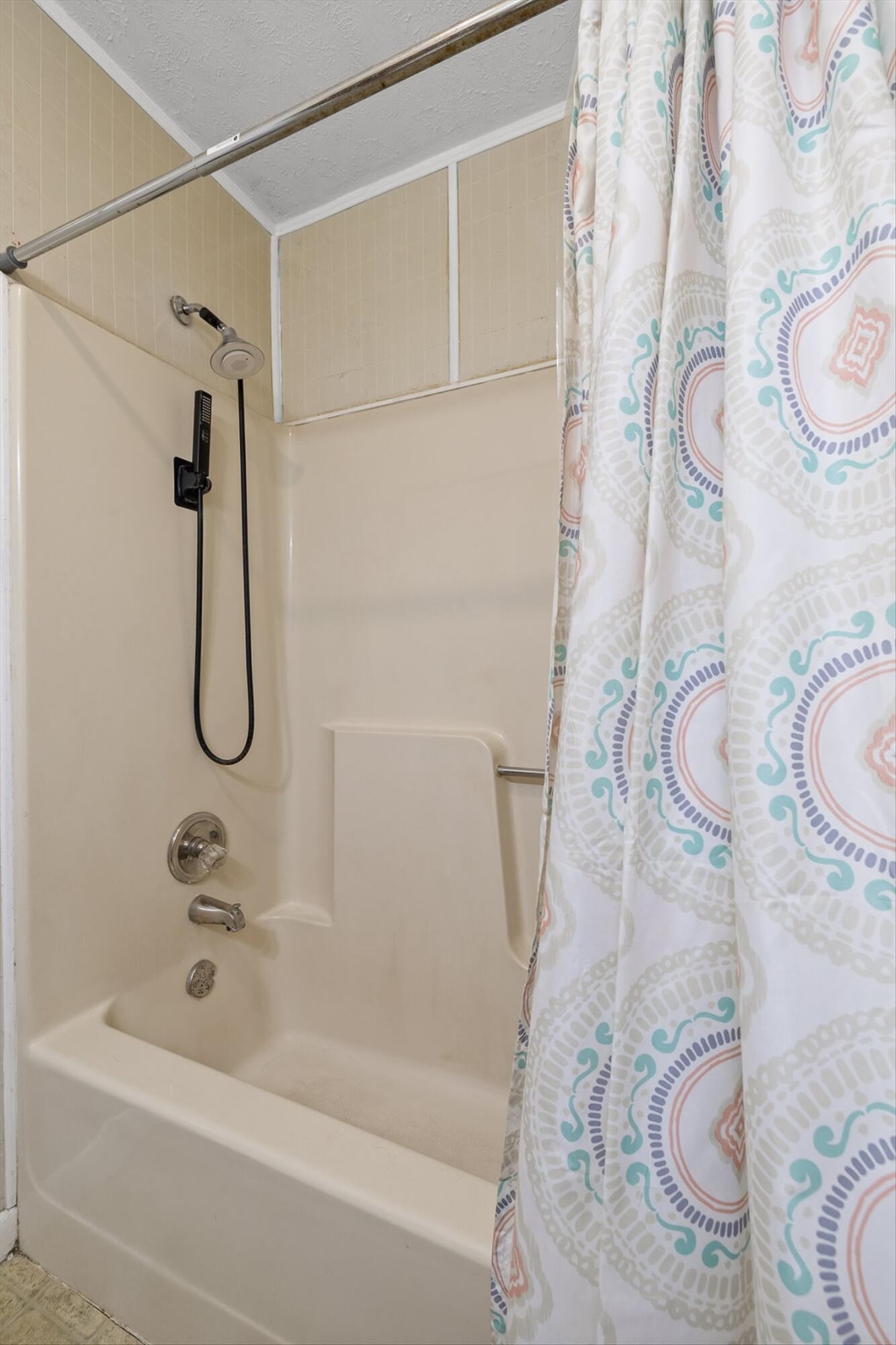 138 Sunset Drive Whitwell, TN 37397 - Photo 16 of 46 a bathroom with a granite countertop shower a sink and a shower