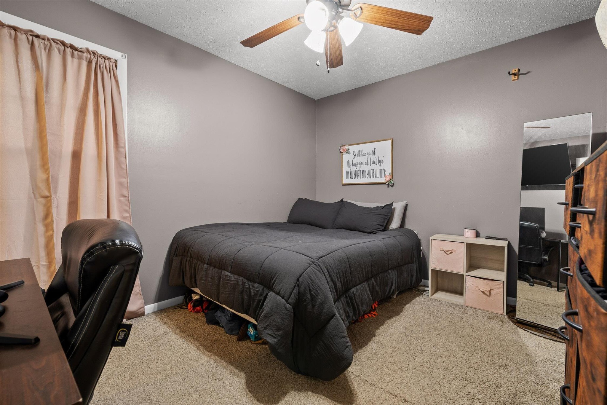 138 Sunset Drive Whitwell, TN 37397 - Photo 18 of 46 a bedroom with a bed and a chair