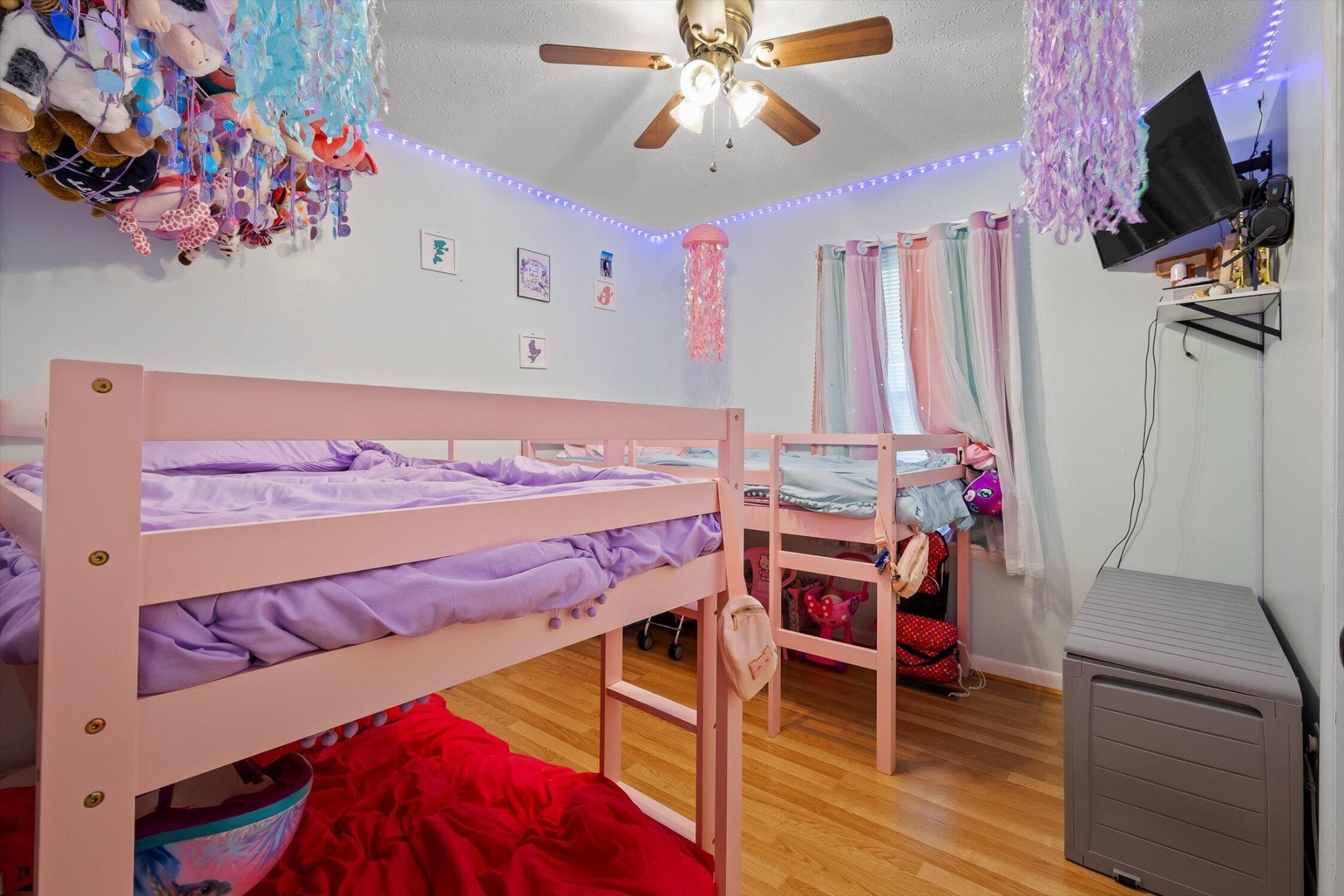 138 Sunset Drive Whitwell, TN 37397 - Photo 19 of 46 a bedroom with a bed and a flat screen tv