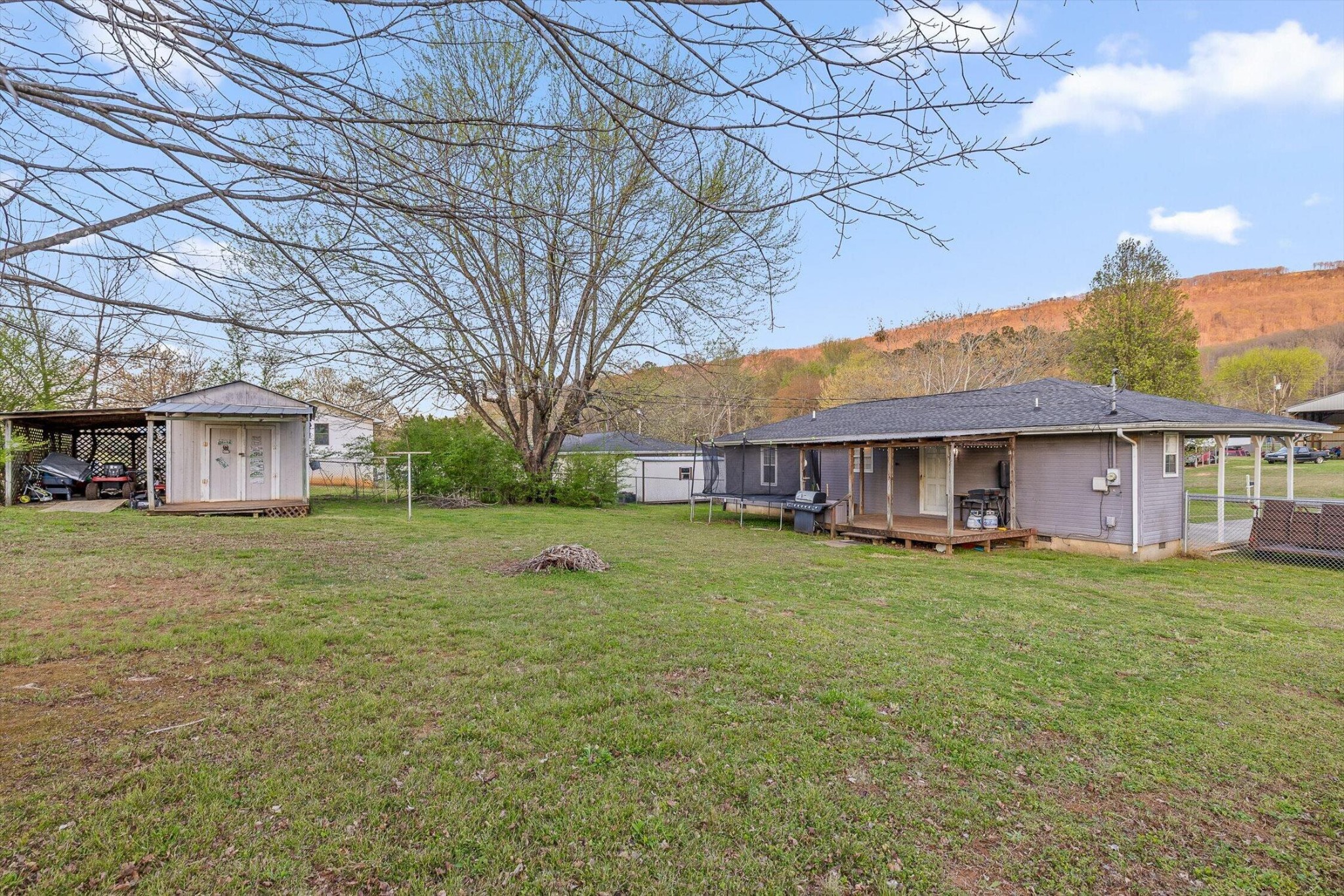 138 Sunset Drive Whitwell, TN 37397 - Photo 24 of 46 a view of a house with a yard