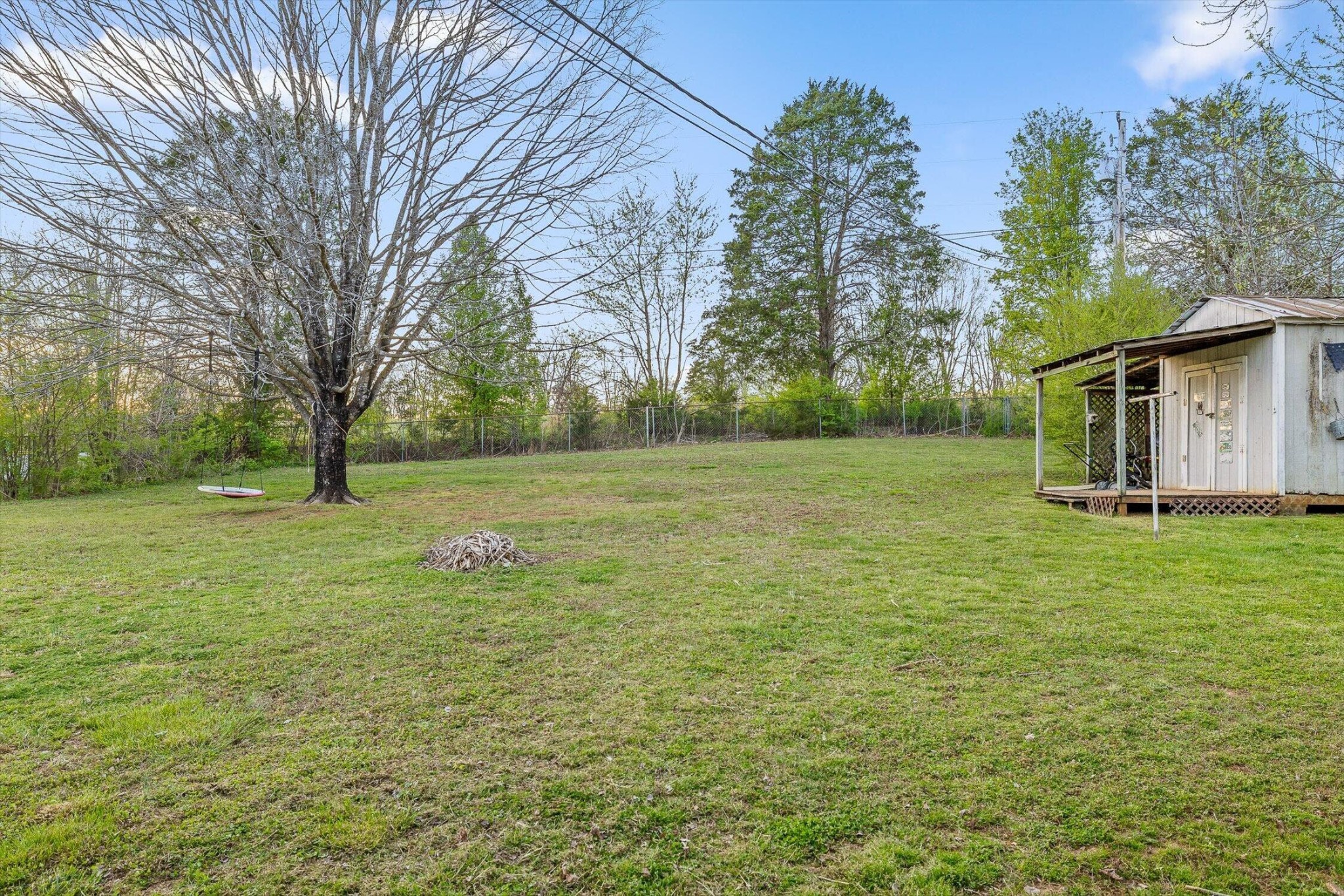 138 Sunset Drive Whitwell, TN 37397 - Photo 29 of 46 a backyard of a house with lots of green space
