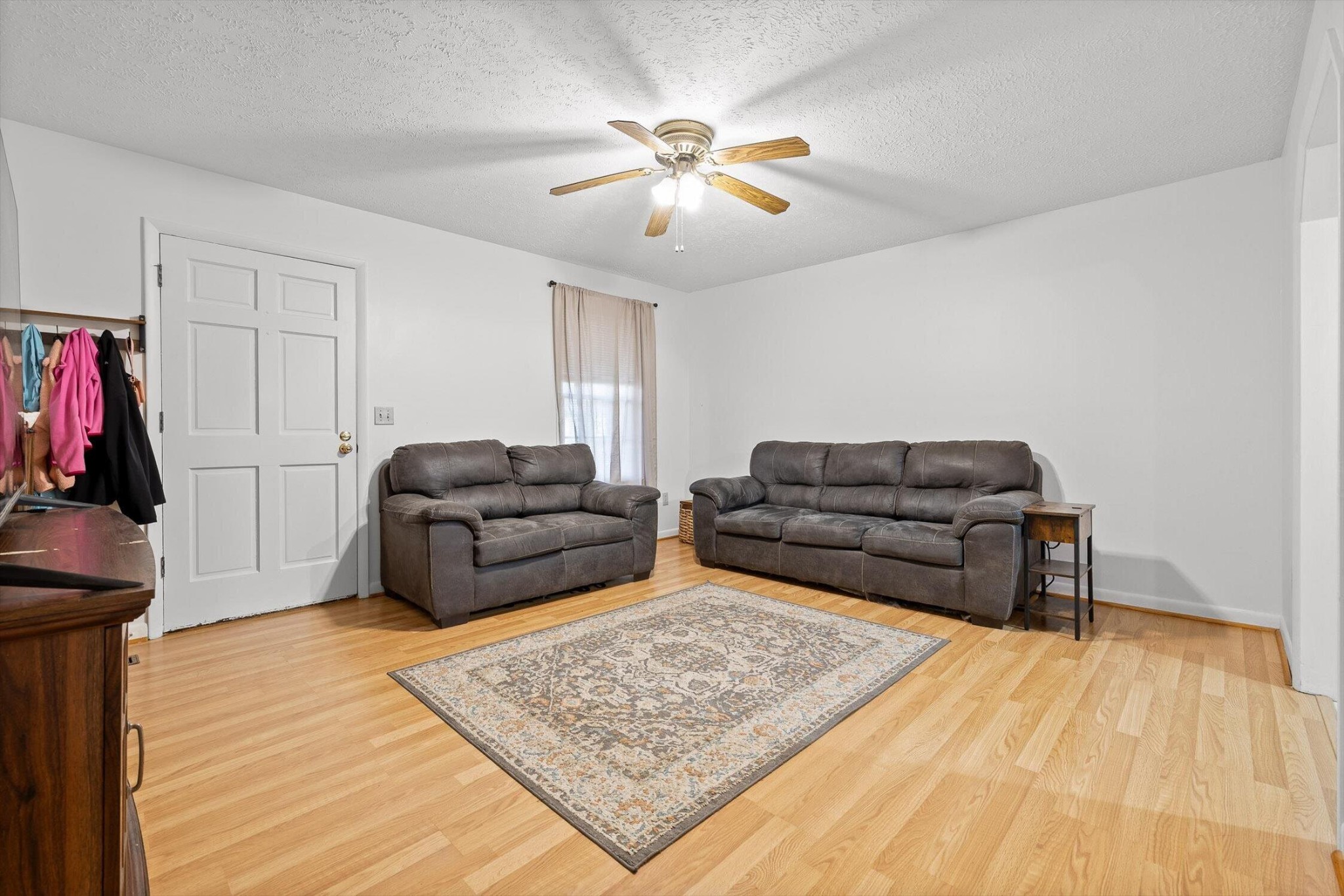 138 Sunset Drive Whitwell, TN 37397 - Photo 4 of 46 a living room with furniture and a wooden floor