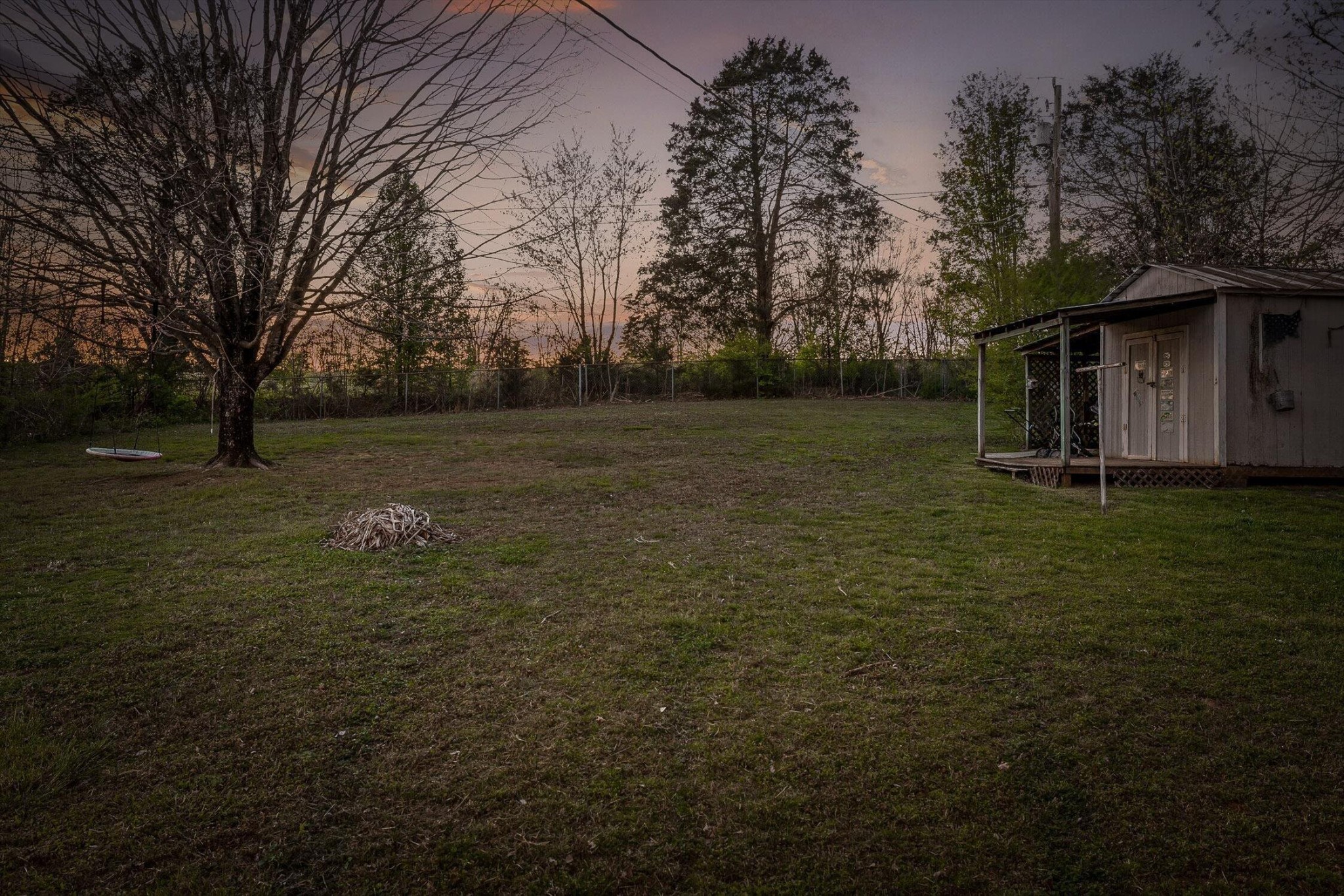 138 Sunset Drive Whitwell, TN 37397 - Photo 45 of 46 a backyard of a house with lots of green space