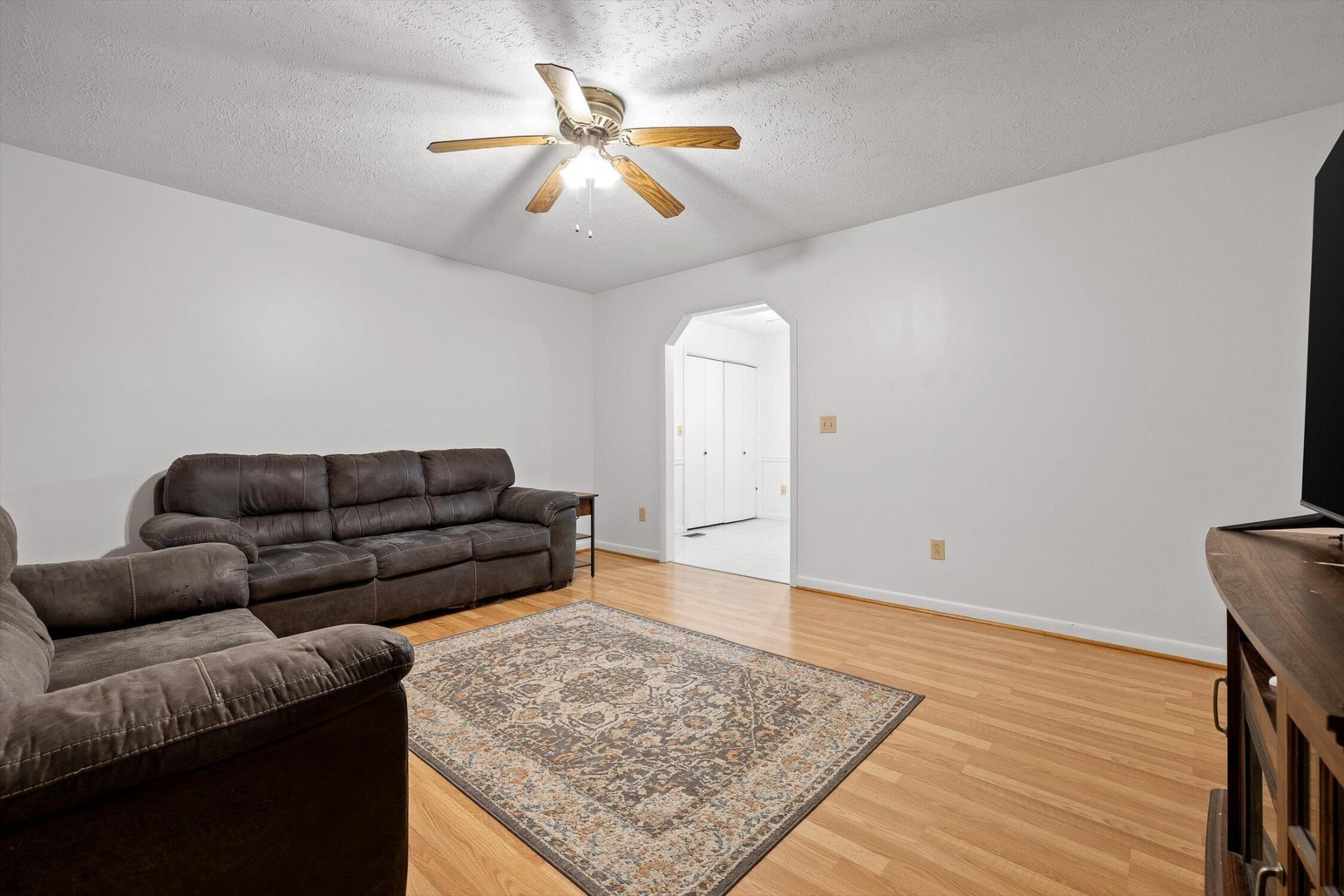138 Sunset Drive Whitwell, TN 37397 - Photo 5 of 46 a living room with furniture and a rug