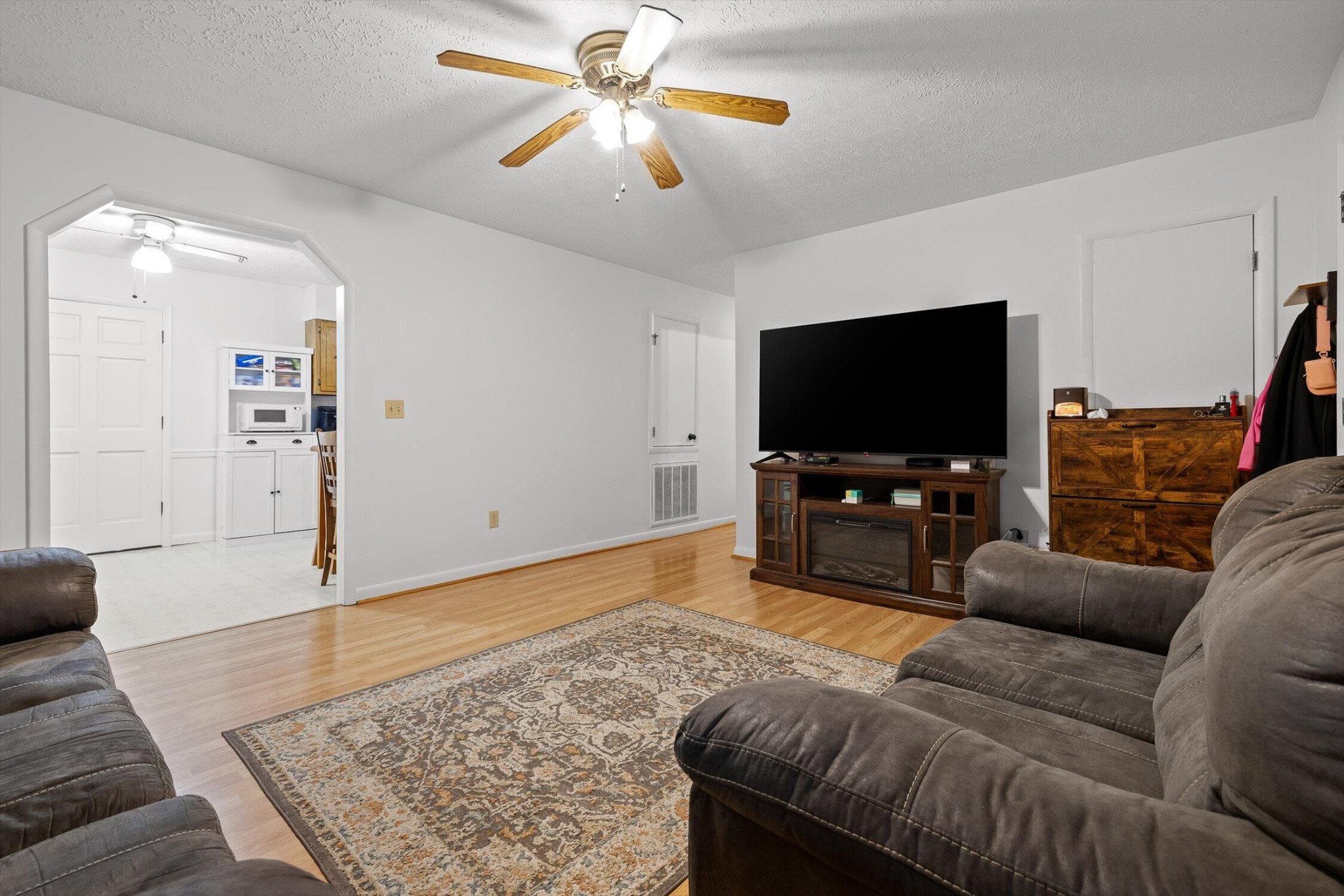 138 Sunset Drive Whitwell, TN 37397 - Photo 6 of 46 a living room with furniture and a flat screen tv