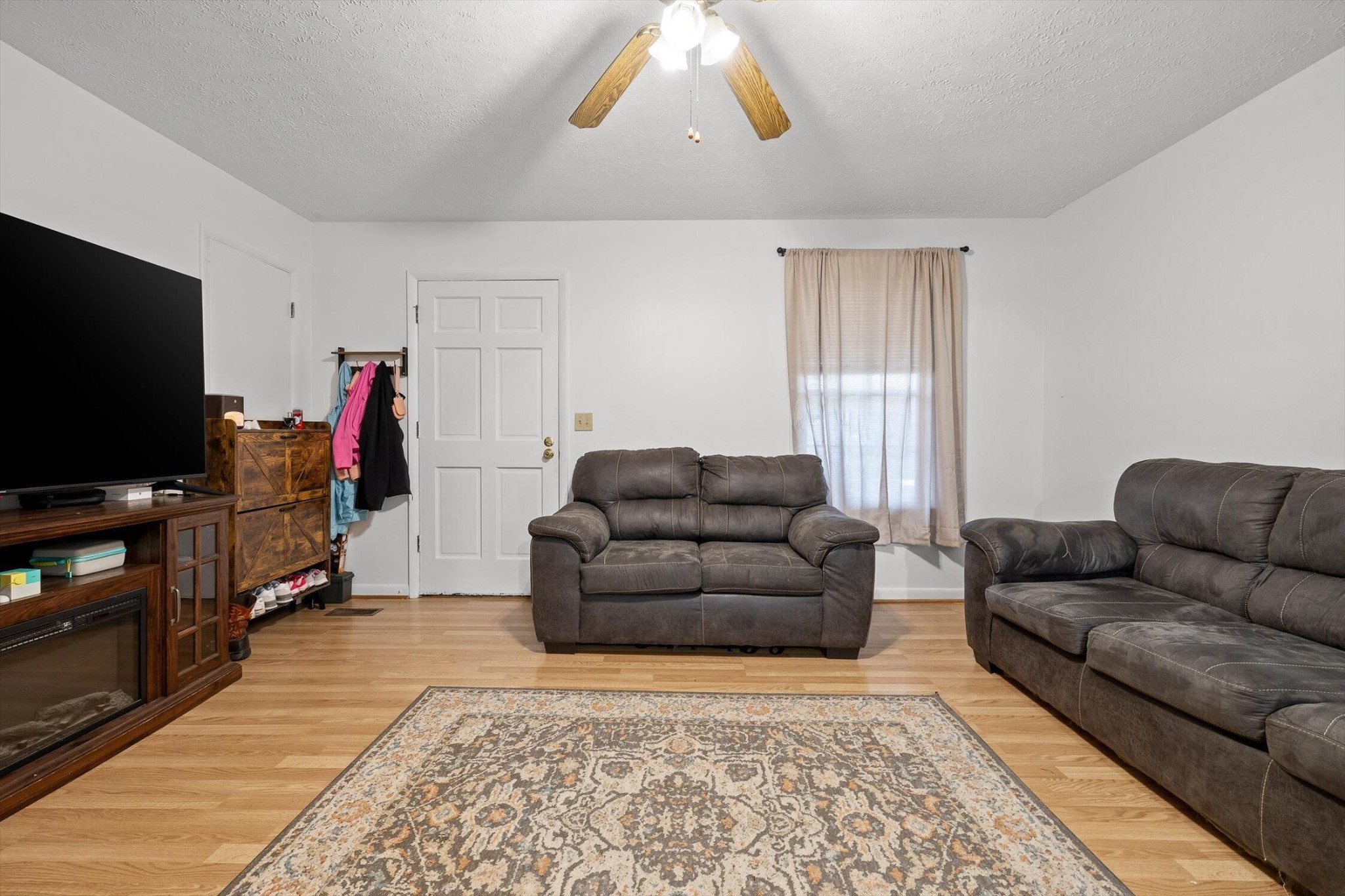 138 Sunset Drive Whitwell, TN 37397 - Photo 7 of 46 a living room with furniture and a flat screen tv