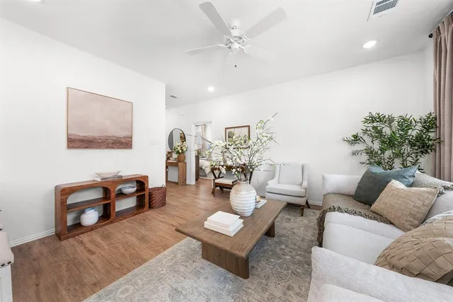 a living room with furniture and a couch