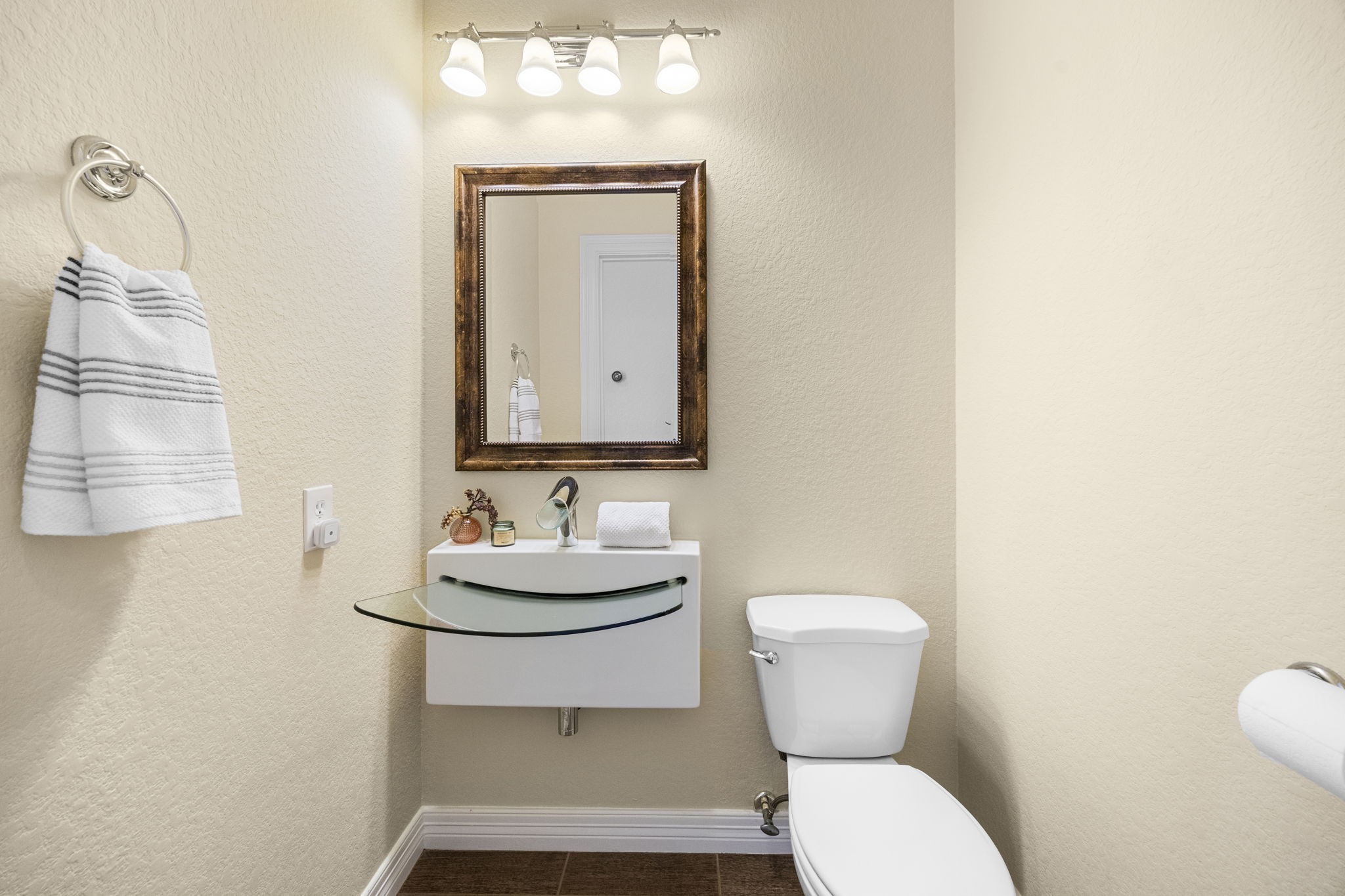 609 Gardner Street Houston, TX 77009 - Photo 13 of 31 a bathroom with a toilet sink and mirror