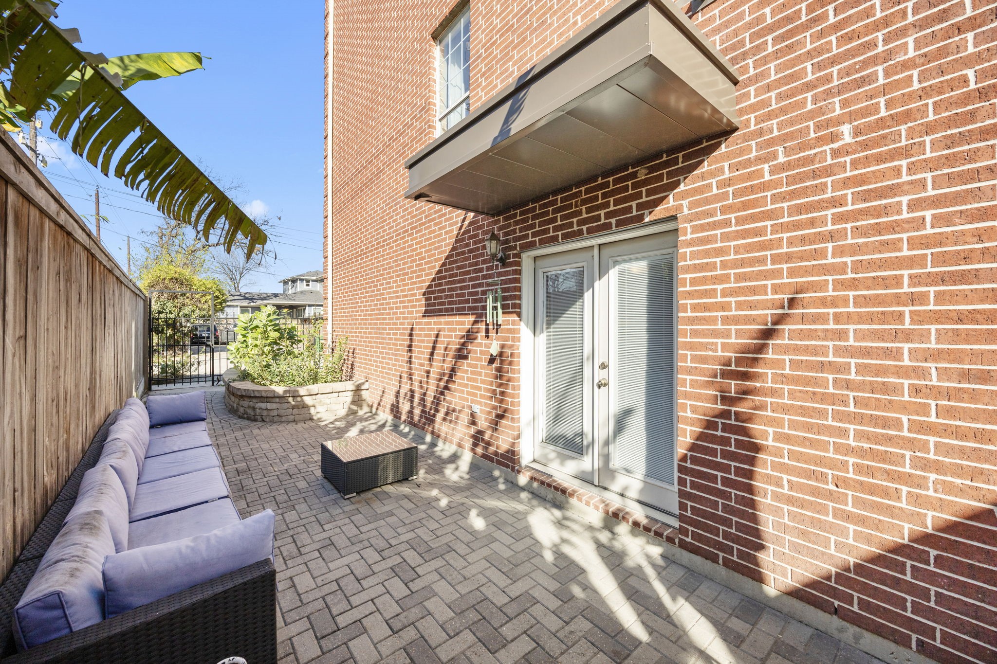 609 Gardner Street Houston, TX 77009 - Photo 29 of 31 a view of a patio with couches and potted plants