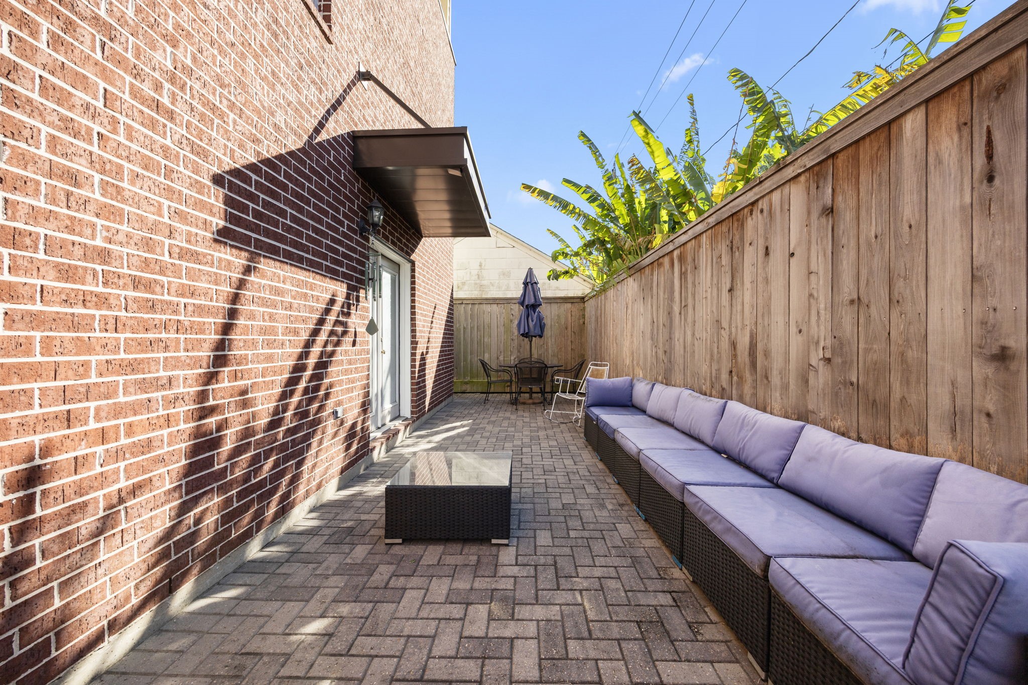 609 Gardner Street Houston, TX 77009 - Photo 31 of 32 Alternate view of the 1st floor yard/patio - plenty of space to entertain! The pavers continue around to the rear of the property creating a low maintenance outdoor space.