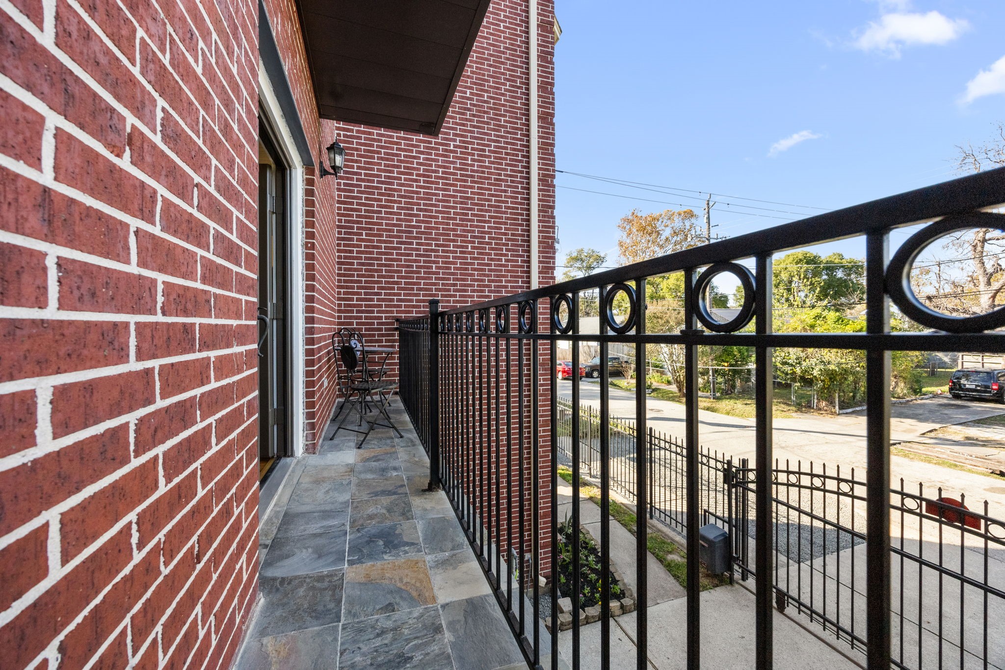 609 Gardner Street Houston, TX 77009 - Photo 6 of 31 a view of a balcony with a potted plant