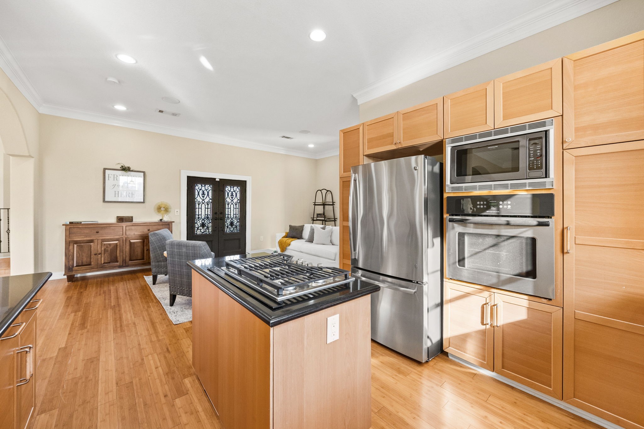 609 Gardner Street Houston, TX 77009 - Photo 7 of 31 a kitchen with stainless steel appliances granite countertop a refrigerator stove and sink