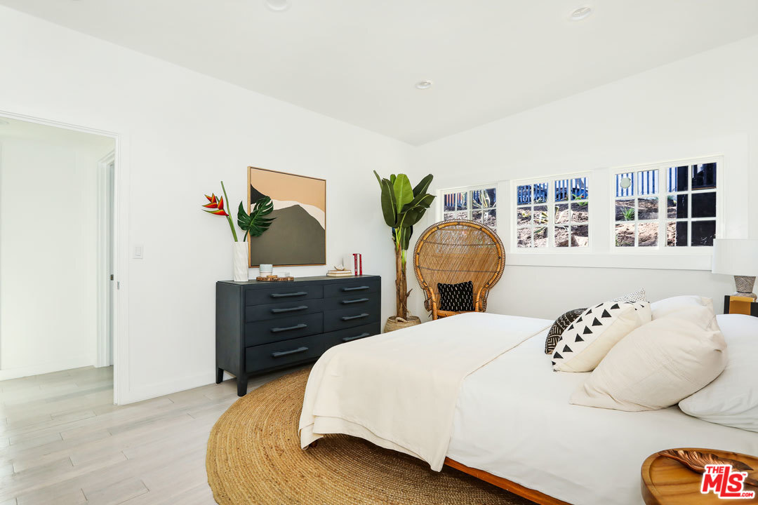 3922 Roderick Road Los Angeles, CA 90065 - Photo 11 of 29 a bedroom with a bed and a dresser